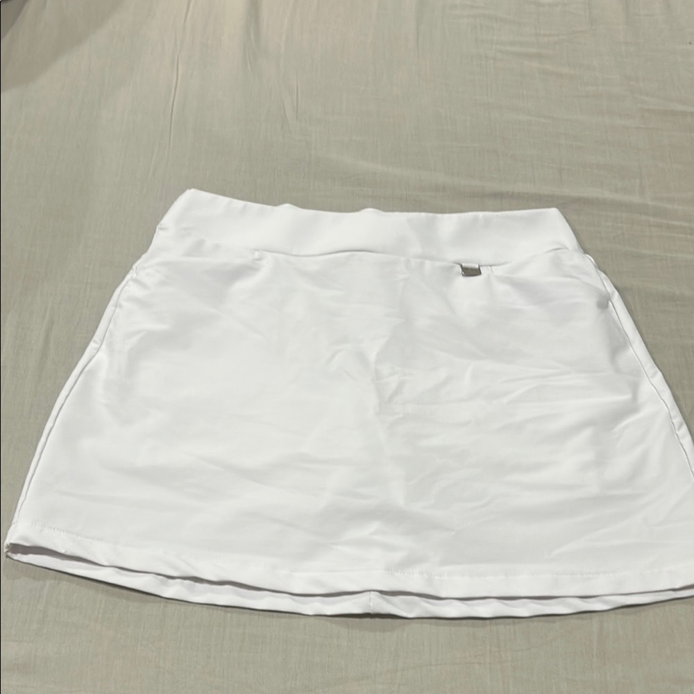 1 x $10.00 or 2 x $15.00 Play dry  Greg Norman White Women's Skort